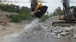 Crushing granite down to size 6cm with the MB Crusher Bucket