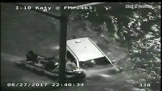 Dramatic rescue of stranded driver in flooded car in Houston area