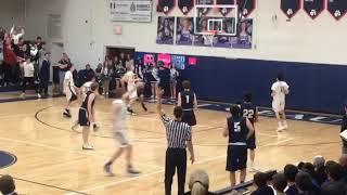 Josh Irwin drains a 3-pointer at the buzzer