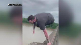 Viral video shows man jump from I-10 bridge during gridlock