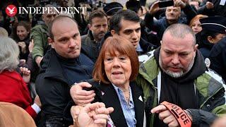 Gisèle Pelicot swarmed as she arrives at court for verdicts of 51 men in mass rape trial