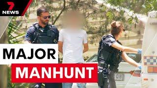 Suburb locked down on Christmas Eve as police hunt for armed trio | 7NEWS