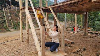 Build wooden stairs and wooden columns to make a path to the second floor