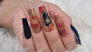 Autumn marble nail art with gel polish and transfer foil.  Fall nail design