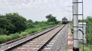 A train crosses river Chandraval in Maudaha