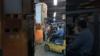 Moving a Safe with a Forklift at the Empire Safe Warehouse in New York