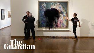 Climate activists throw black liquid at Gustav Klimt painting in Vienna