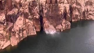 Cliff jumping fail  Rock gives way...