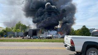 Fire crews battle large fire in Corning