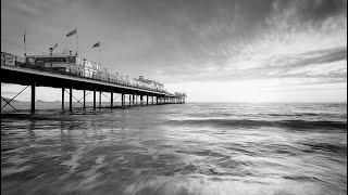 Piers & Jetties. A slideshow of fine art seascape photography, fading from black & white to colour