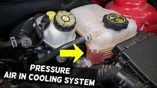 WHAT CAUSES PRESSURE AND AIR IN THE COOLING SYSTEM AND OVERFLOW TANK ON CHEVROLET CRUZE CHEVY SONIC