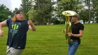 Following A Fat Man Around With A Tuba