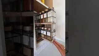 Spice cabinet pullout organizing. #declutter #clutterfree #decluttering #organizing #kitchen #simply