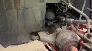 Dismantling the inner drive shaft axle ona a Volvo V70