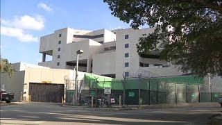 Viral video shows line of police cars waiting to drop off arrestees at Miami-Dade jail