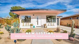 Fully furnished, turnkey mid-century modern home situated in the vibrant Old Town Yucca Valley!