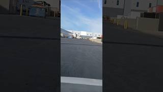 Driver fails backing into loading dock.