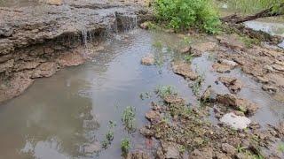 Digging Oklahoma for old bottles  and relics Exposes all kinds of history  in the mud Cork tops