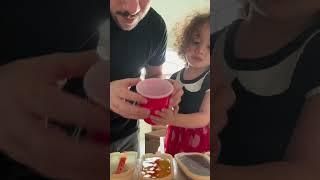 Dad and Ava make popsicles.