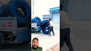 Worker loading tyres easily trick #automobile #tyre #machine #shortsfeed