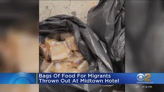 Bags of food for migrants thrown out at Midtown hotel