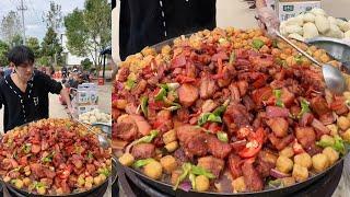 A Handsome Chinese Guy Cook Pork Potato Bread Not Noodles Food for the elders on the Street