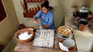 This Village Dish of Wheat Flour cooked inside Bamboo Stems goes well with Fish Curry & Chili Paste