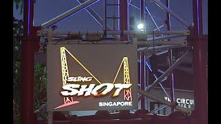 Riding the Slingshot ride is an exhilarating mix of thrill, fear, and pure fun!