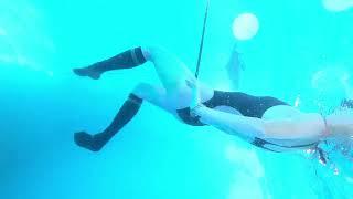 girl underwater and  breathhold in 5meter depth pool