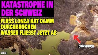 Disaster in Switzerland - River Lonza has breached dam - water flows away
