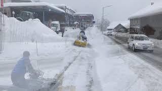 Quad beim Schneefräsen mit Rammy Schneefräse Snowblower