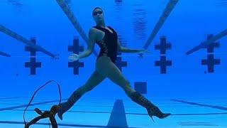 Artistic Swimmer Walks Upside Down in Heels