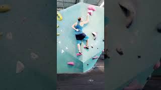 5.12 one handed short bouldering problem.