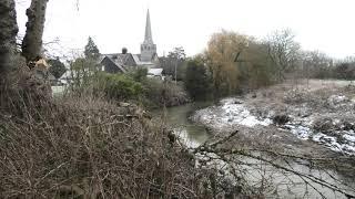 A Church in Horley, Surrey by the River Mole in winter.