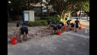 China's PLA soldiers help clean up Hong Kong streets