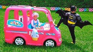 Nikita in a pink car meets superheroes