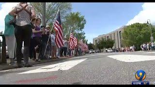 Hundreds Line Streets as Law Enforcement Escorts Fallen Hero's Body Home