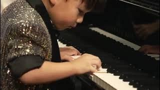 3-year-old Barron Cheng performing piano with the orchestra