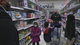 Children go on shopping spree with Louisville Metro Corrections officers