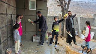 Master Mustafa's work on the porch wall in heavy snow and rain