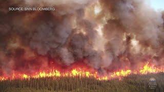 Raging Wildfires Burn Across Canada Sending Smoke Down to the US