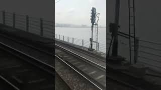 Mumbai Harbour Line Local crossing Vashi Creek Bridge