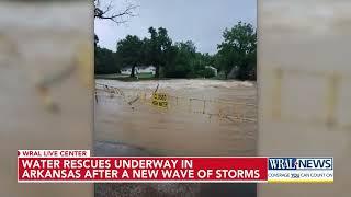 Water rescues underway in Arkansas after a new wave of storms across US and Canada