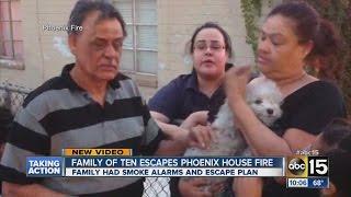 Family of ten, dog escape Phoenix house fire