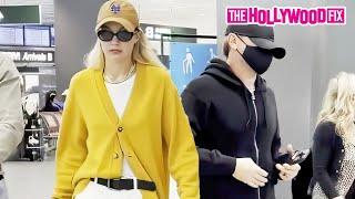 Leonardo DiCaprio & Gigi Hadid Land Together At The Airport But Pretend To Be Separate In Milan, IT