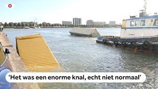 Schip ramt Willemsbrug in Rotterdam, containers in het water