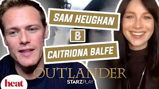 ‘They Can’t Keep Their Hands Off Each Other!’ Sam Heughan & Caitriona Balfe React To Outlander