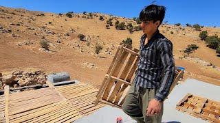 "Joint effort: installing pallets on the roof of a warehouse with the presence of Ali and Abu"