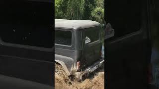 UAZ Hunter drives through the swamp