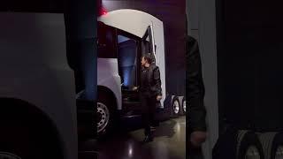 Elon Musk entering the stage driving Tesla Semi.